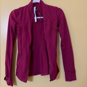 lululemon new define jacket. 
Color pomegranate